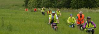 Biking through field